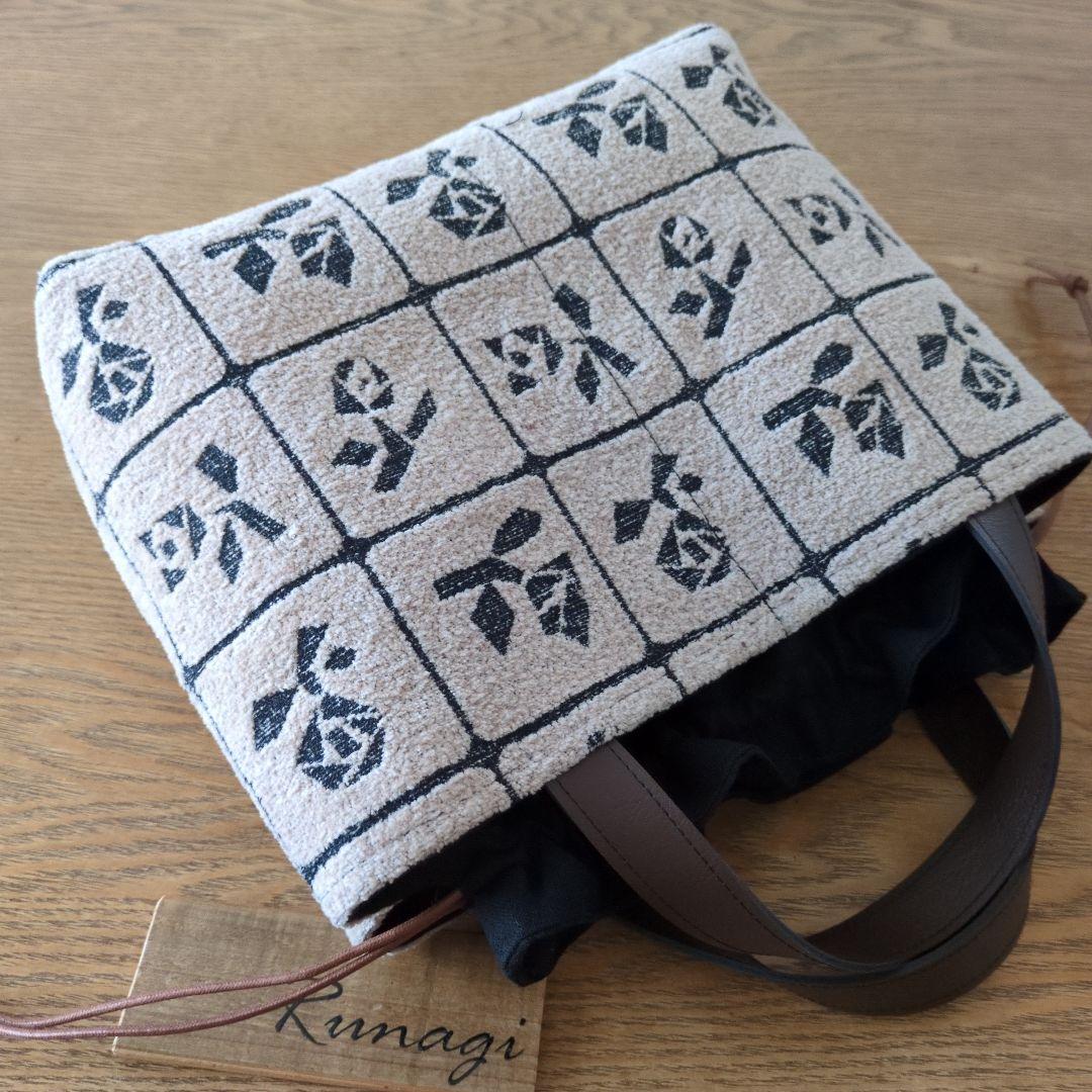 【1551】あおりポケットの巾着バッグ＊ミナペルホネン