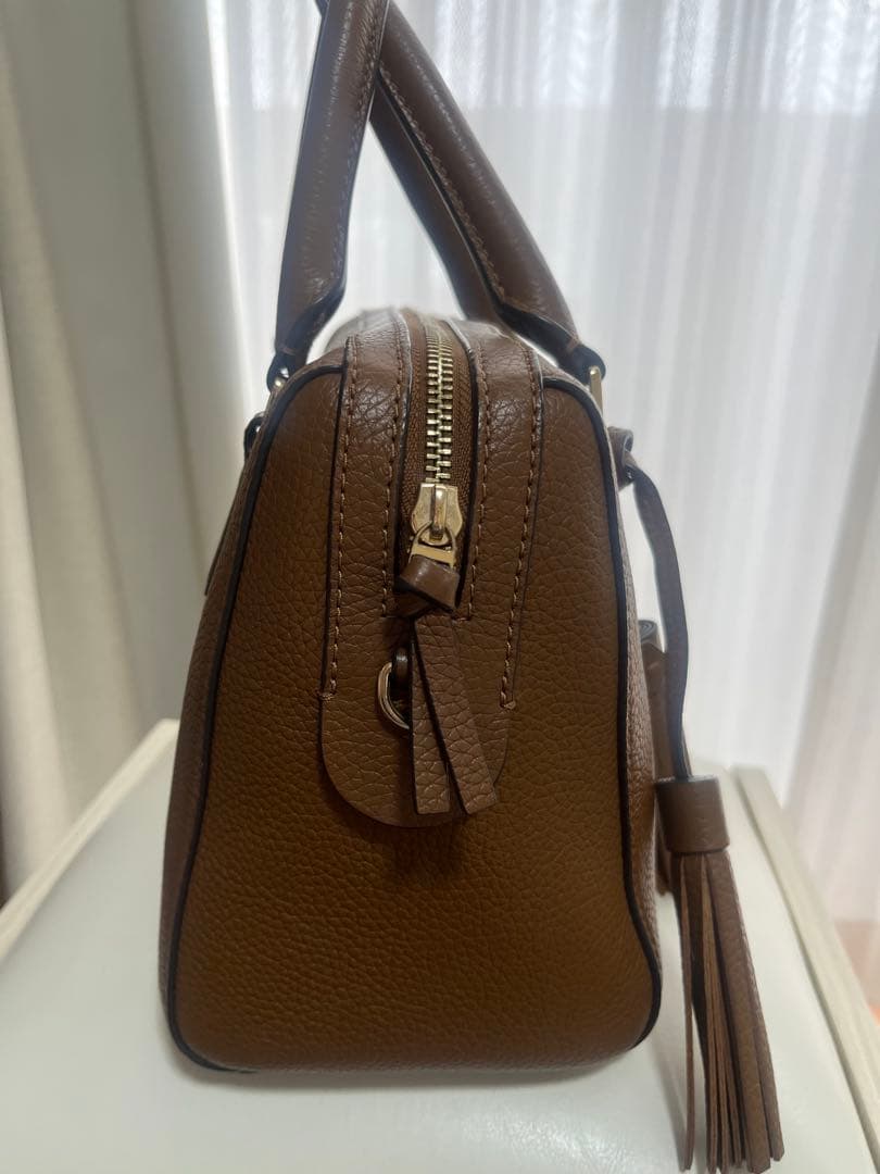 な*ぺ様 ブラウンレザー ハンドバッグ タッセル付き