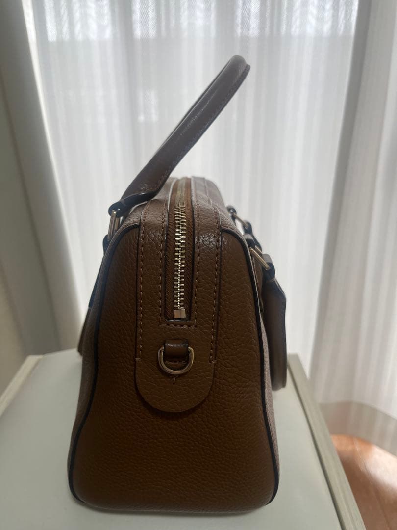 な*ぺ様 ブラウンレザー ハンドバッグ タッセル付き