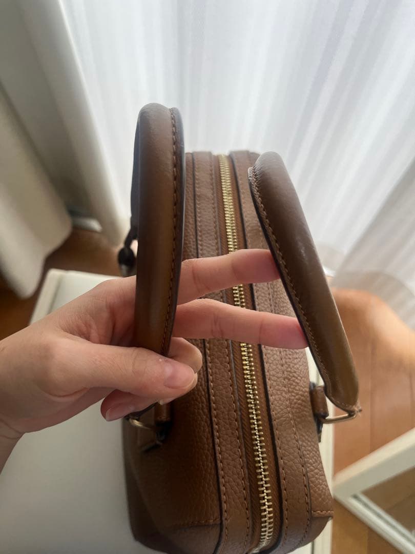 な*ぺ様 ブラウンレザー ハンドバッグ タッセル付き