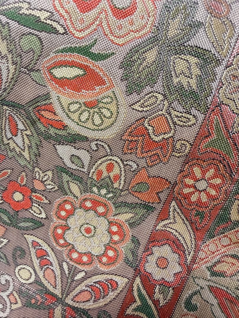 高級 袋帯 正絹 六通柄 更紗花文 オレンジ 洒落帯 シャレ帯 小紋 訪問着