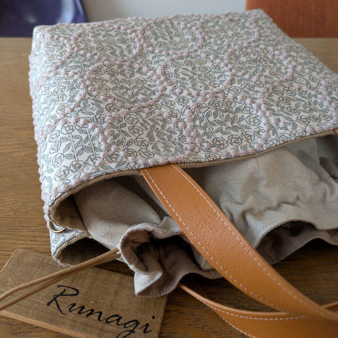 【1548】あおりポケットの巾着バッグ＊ミナペルホネン